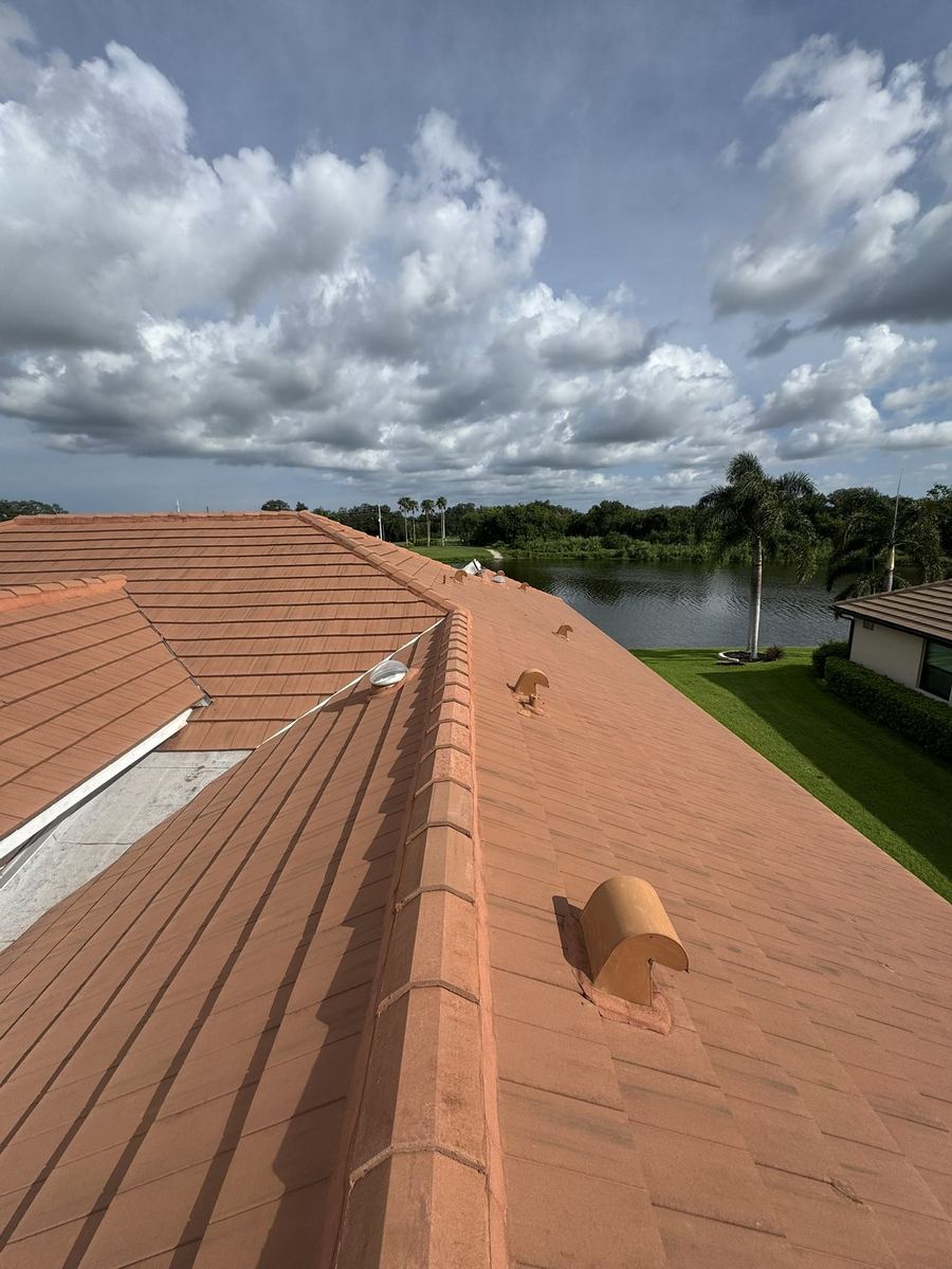 The same tile roof after soft washing, clean and streak free